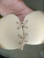 Close up of the adjustable corset lace-up string on the Xelxia backless bra.