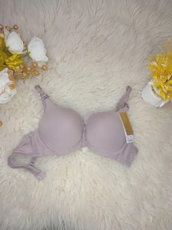 Flat lay of the Xelxia Dove Grey smooth cup push up bra.