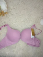 Flat lay of the Xelxia Dusty Rose smooth cup push up bra.